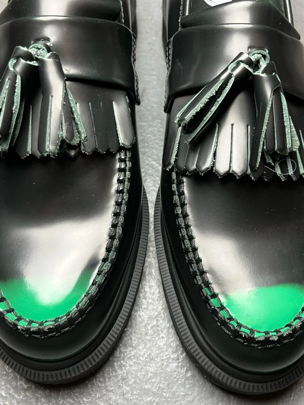 Dr. Martens Black Loafers with Green Toe Accent and Tassels